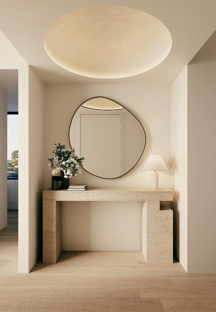 Norwich Crows Nest — entry foyer with travertine console and organic mirror